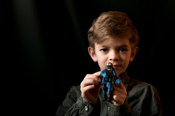 Portrait image of a small boy with brown eyes