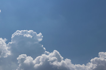 blue sky with white cumulus clouds on a sunny clear day. natural background for later design. predic