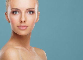 beautiful face of young and healthy woman. skin care, cosmetics, makeup, complexion and face lifting