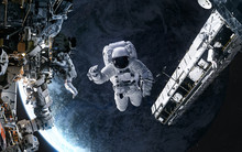 Astronauts, Space Station In Orbit Of A Deep Space Planet. Science Fiction. Elements Of This Image Furnished By NASA