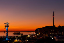 View Of Brighton At Night With Sunset