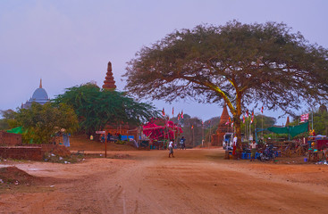 Wall Mural - The street cafe under the tree, Bagan, Myanmar