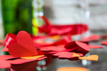 Paper Hearts, Red Tape On The Two Glasses Of Champagne, Bottle On The Stone Background.