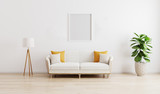 Fototapeta  - Blank frame in bright modern living room with white sofa, floor lamp and green plant on wooden laminate. Scandinavian style, cozy interior background. Bright stylish room mockup.3d render
