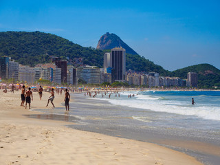 Fototapete - Copacabana beach and mountain Sugarloaf in Rio de Janeiro, Brazil. Copacabana beach is the most famous beach in Rio de Janeiro. Sunny cityscape of Rio de Janeiro