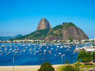 Fototapete - The mountain Sugarloaf and Botafogo beach in Rio de Janeiro, Brazil. Sugarloaf is one of the main landmark of Rio de Janeiro. Cityscape of Rio de Janeiro