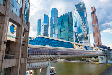 Moskva-city. Skyscrapers of glass and concrete. Glazed bridge over the river Moscow. Business card of the capital of Russia. Modern urban architecture. Downtown.