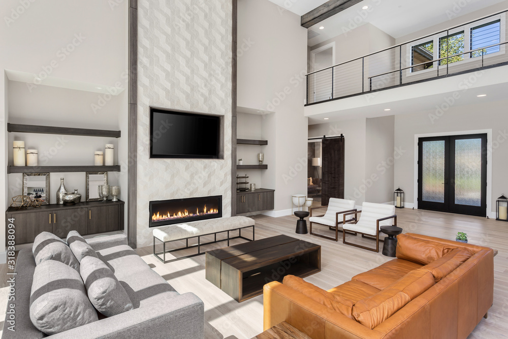 Beautiful living room interior in new luxury home. Features floor to ...