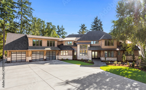 Fotomural Luxury home exterior on sunny day with blue sky
