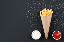 French Fries On The Dark Background.