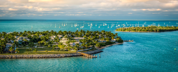 Wall Mural - Panoramic sunrise landscape view of the small Islands Sunset Key and Wisteria Island of the Island of Key West, Florida Keys.