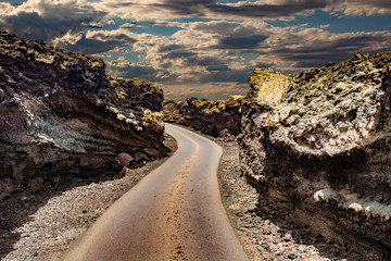 Wall Mural - image related to unexplored road journeys and adventures.road through the scenic landscape to the de