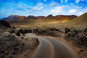 Wall Mural - image related to unexplored road journeys and adventures.road through the scenic landscape to the de