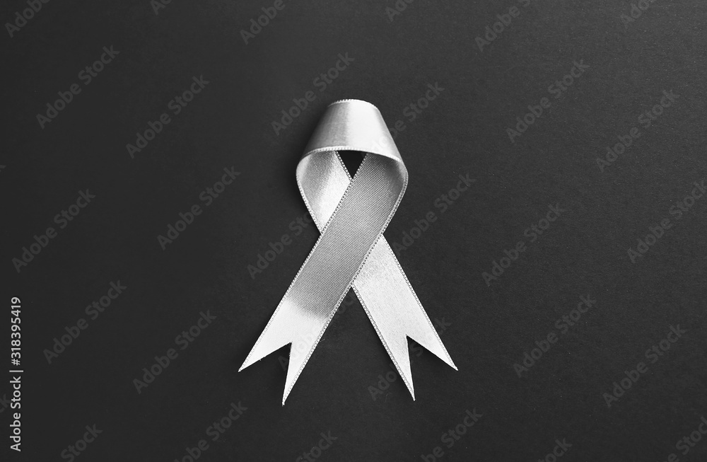 Silver ribbon on dark background