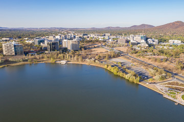Wall Mural - Panoramic aerial view of Canberra City looking north over Lake Burley Griffin with the Ovolo Nishi building, NewActon South Building and BreakFree Capital Tower 