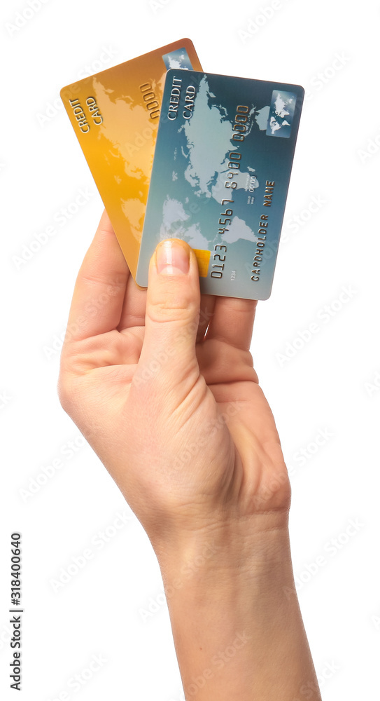 Female hand with credit cards on white background