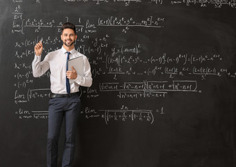 Sticker - Male teacher near blackboard in classroom