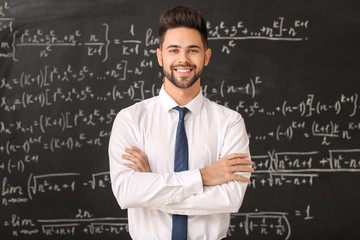 Sticker - Male teacher near blackboard in classroom