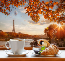 Coffee With Croissants Against Famous Eiffel Tower In Paris, France