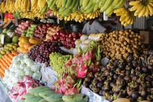 Fruits Arranged At Market For Sale