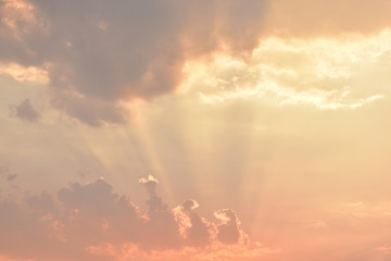 golden light rays of sunset sky background