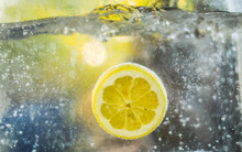 Close-Up Of Lemon Slice In Water
