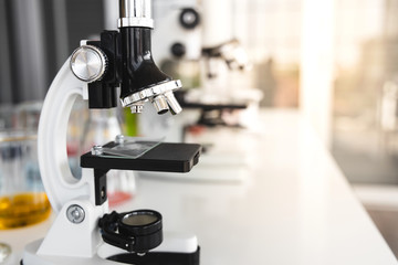 Microscope in laboratory. Medical equipment technology and research concept.