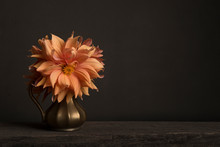 Bouquet Of Blooming Chrysant Flowers In A Golden Vase On A Table In A Classical Fine Art Image