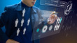© ktasimar - Business administrator in action of manpower or human resource planning or business organisation on a futuristic augmented reality virtual dashboard.