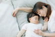 © affect - Mother and son sleeping together