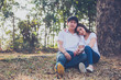 © reewungjunerr - Portrait of young asian couple in love  in the forest,Thailand people happy to be together,Valentine day concept