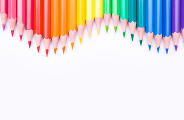 Different color pencils on white background. Composition with colored pencils, closeup view, space for text