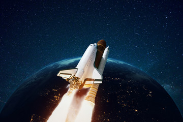 Fototapete - Rocket flies in open space against the background of a planet with stars. Space ship in space. Planet earth with ship