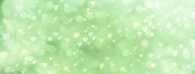 abstract green background with many hearts