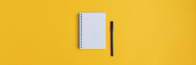 Wide View Image Of Blank Spiral Note Pad And Black Marker