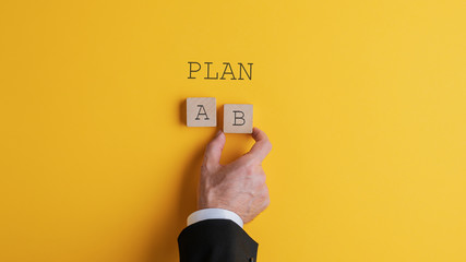 businessman choosing plan b