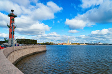Rostral Column And Neva River In St Petersburg, In Russia.