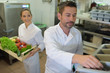 © auremar - portrait of two chefs with vegetables