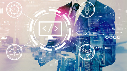 Web development concept with businessman holding a tablet computer