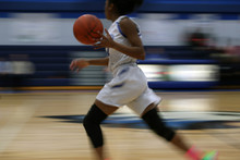 Fast Break During A Girls High School Basketball Game