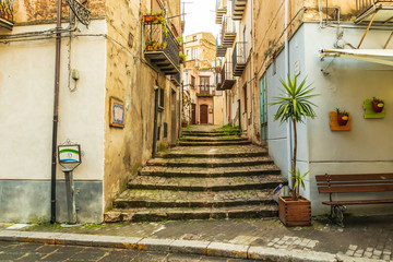  Italy, Sicily, Palermo Province, Castelbuono. Stairs on a narrow side street in the town of Castelbuono.