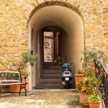 Italy, Sicily, Messina Province, Caronia. An Arched Pathway Through A Stone Building In The Medieval Town Of Caronia.