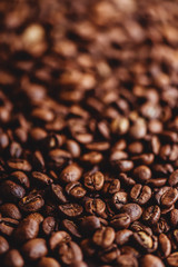 Wall Mural - Coffee grains. Background of roasted coffee beans brown. layout. Flat lay.