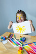 © Angelina - little girl paints the yellow sun