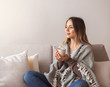 © Prostock-studio - Peaceful girl enjoying hot coffee at home, empty space
