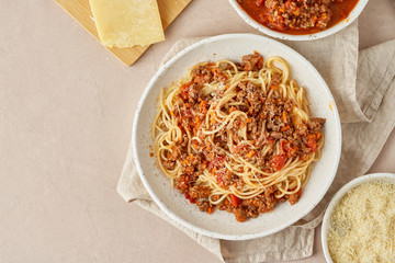 Wall Mural - Pasta Bolognese with spaghetti, mincemeat and tomatoes, parmesan cheese. Italian cuisine