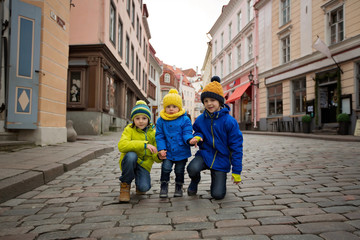 Wall Mural - Tallinn, Estonia during winter season, children walking