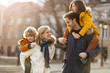 © pikselstock - Affectionate young family enjoying their day in a city