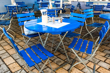 Wall Mural - table and chairs at a cafe