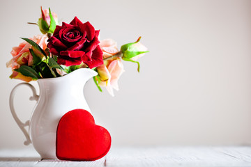Wall Mural - greeting card with flowers and heart. background with copy space. selective focus.